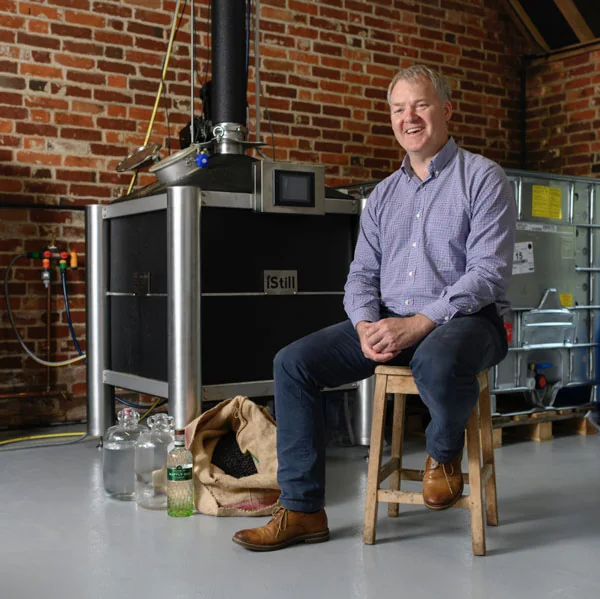 Jon at The River Test Distillery beside his iStill.