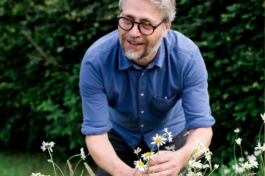 Joff Curtoys, founder of Sloemotion Distillery, among the botanicals.