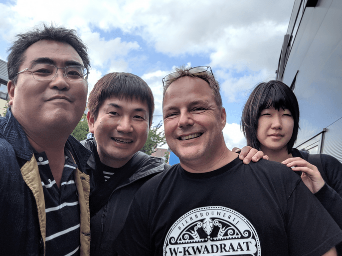 Japanese distilling team posing together during an iStill visit.