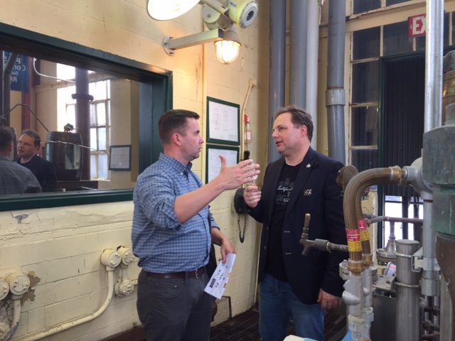 Roger and Odin talking heads and tails at Buffalo Trace.