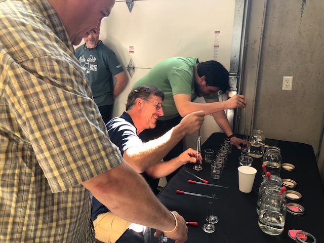 Students work through whisky blending exercises.