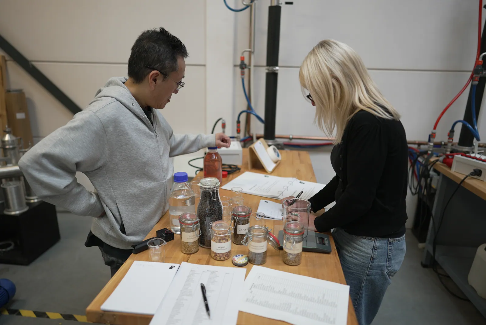 Two participants working together on their recipe.